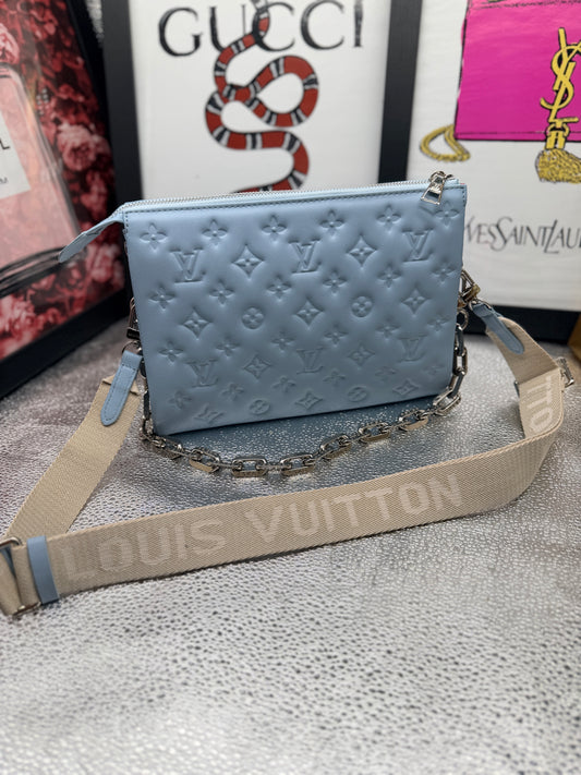 Blue embossed crossbody